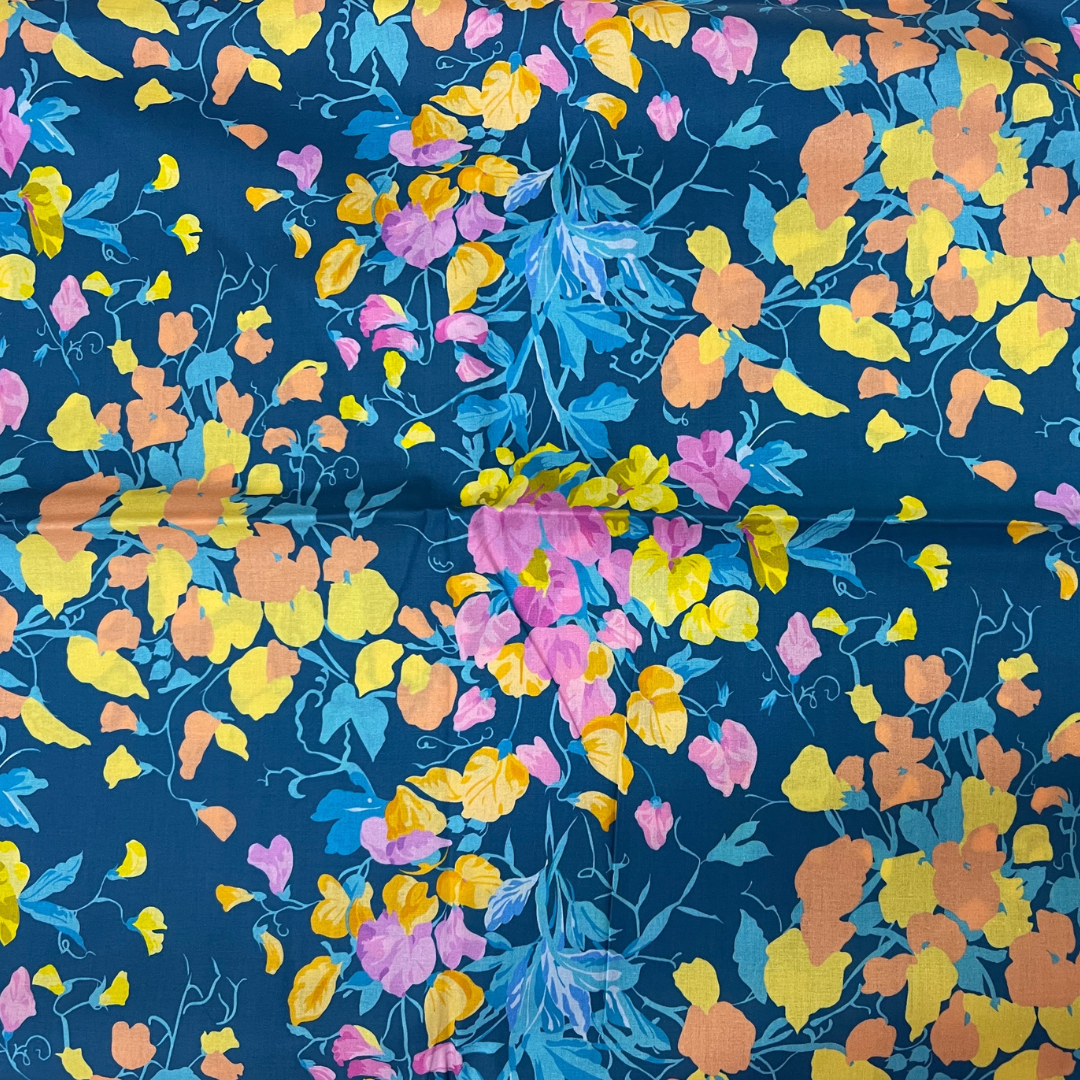 Vibrant Floral Harmony on bright petrolium fabric